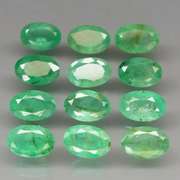 Vivid! Top green 5.31ct Colombian Emerald set