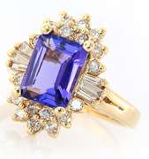3.16ct Emerald Cut Tanzanite and 1.00ctw Diamond Starburst Yellow Gold Ring