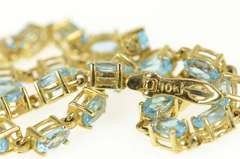 10K Yellow Gold Oval Blue Topaz Classic Statement Tennis Bracelet