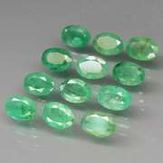 Vivid! Top green 5.31ct Colombian Emerald set
