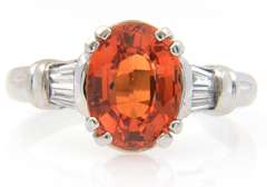5.66ct Oval Orange Garnet and Baguette Diamond Ring in 18K