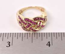 Lovely Ruby Braid Style Ring in Yellow Gold