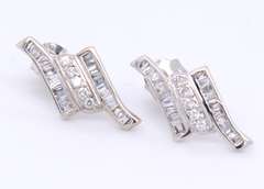 Spectacular 18kt White Gold Baguette and Round Brilliant Cut Diamond Necklace, Bracelet and Earrings Set