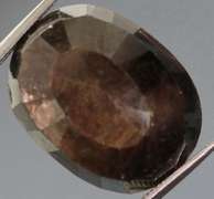 Huge untreated 23.30ct earth toned faceted Sapphire
