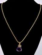 Glamorous Amethyst and Diamond Pendant Necklace in 14K Yellow Gold