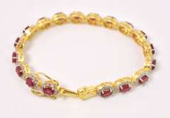 Fabulous 12.35CTW Oval Cut Ruby & 3.50CTW Diamond Tennis Bracelet in Gold Plated Sterling Silver
