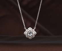 Bold and Detailed Flower Dancing stone pendant