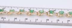 Gorgeous Two Tone Gold Oval Emerald and Diamond Tennis Bracelet