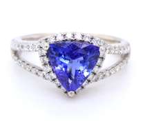 Powerful White Gold Trillion Cut Tanzanite and Diamond Halo Ring