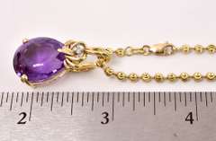 Glamorous Amethyst and Diamond Pendant Necklace in 14K Yellow Gold