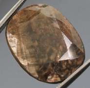 Huge untreated 23.30ct earth toned faceted Sapphire