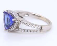 Powerful White Gold Trillion Cut Tanzanite and Diamond Halo Ring