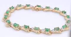 Gorgeous Two Tone Gold Oval Emerald and Diamond Tennis Bracelet