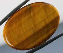 Mezmerizing 37.22ct Tigers Eye cabochon