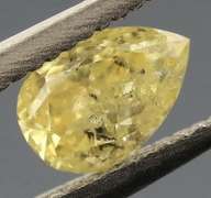 Pear cut .25ct canary yellow Diamond