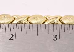 Beautiful XO Style Bracelet in 14K Yellow Gold