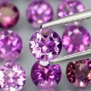 Glittering 7.12ct round cut Bolivian Amethyst set