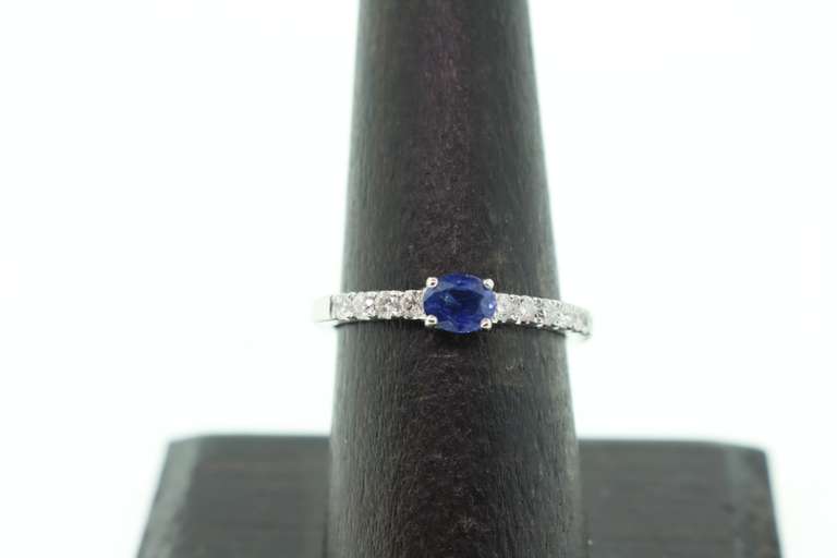 Forlorn Sapphire 18k White Gold Ring flanked with Diamonds