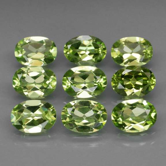 Dazzling 7.40ct untreated apple green Peridot set