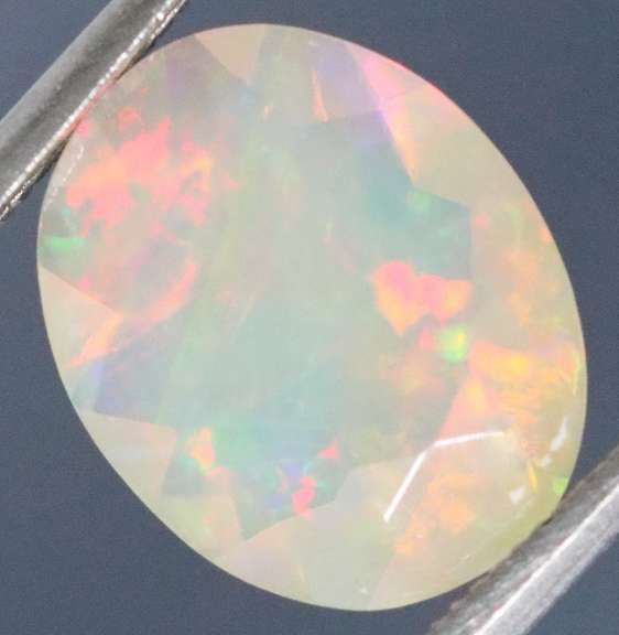 Excellent glittering 1.88ct faceted Jelly Opal
