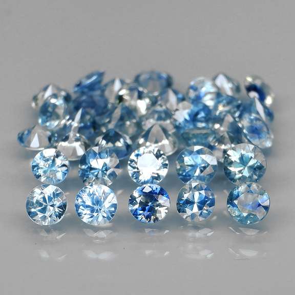Multi-hue 3.92ct natural blue green Sapphire set
