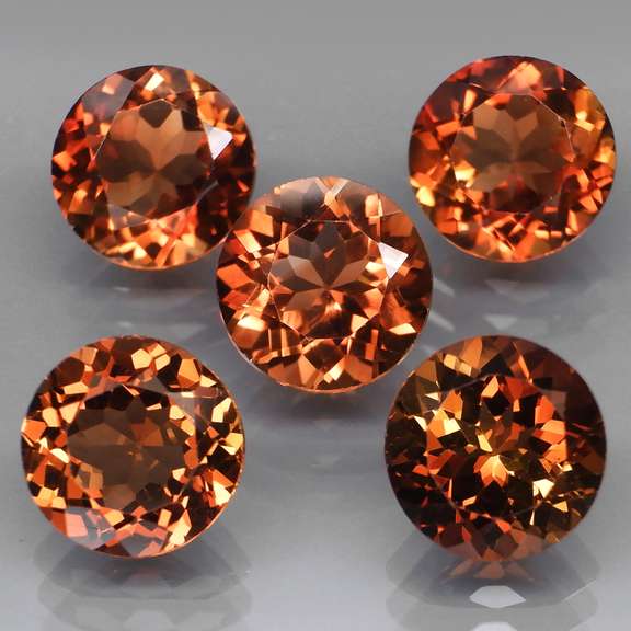 Gorgeous round cut 11.59ct Imperial Topaz set