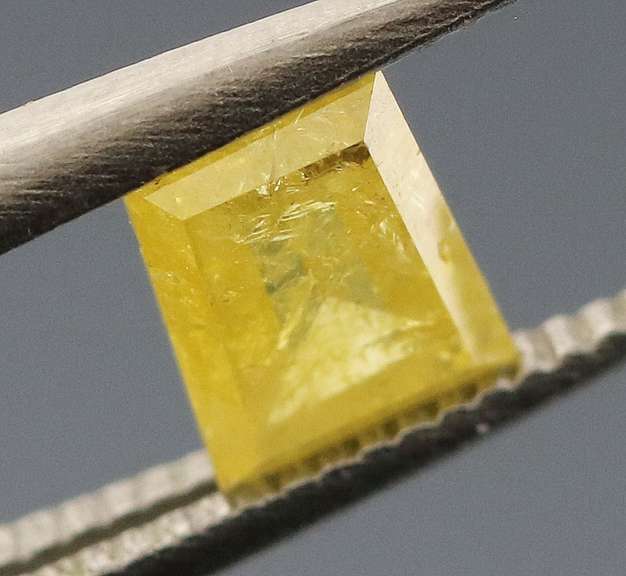 Unique shape! .41ct pear cut canary yellow Diamond