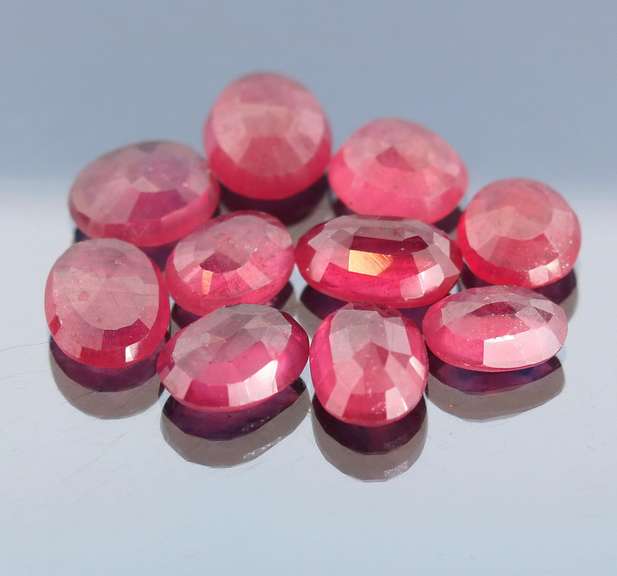 Heavy 45.94ct oval cut Ruby set