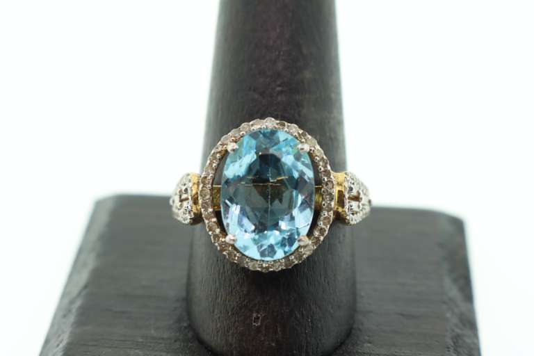 Charming Gold Plated Silver Topaz Ring with Diamond Accents