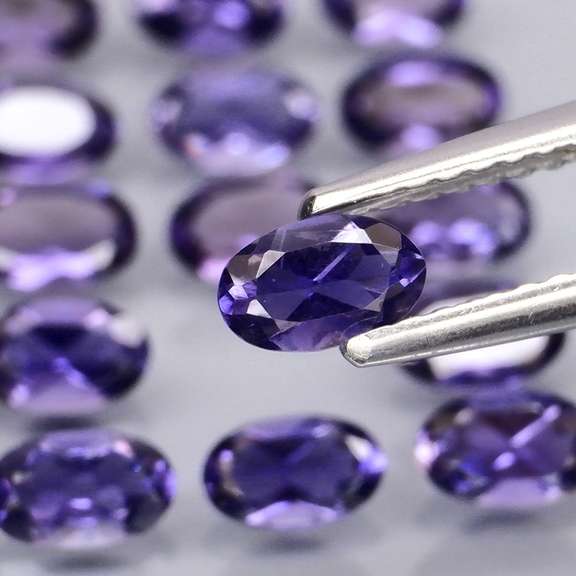 Stunning 4.08ct high luster blue violet Iolite set