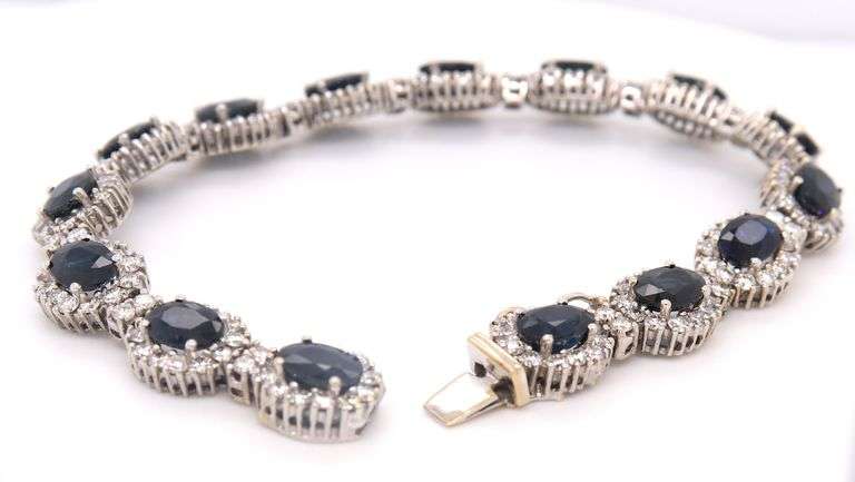 Remarkable white Gold oval Sapphire and Diamond Halo Bracelet