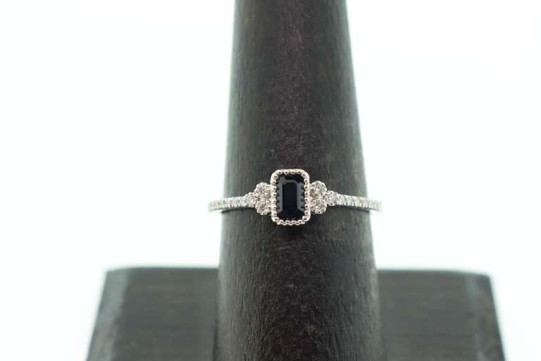 Regal Sole Sapphire 18k White Gold Ring with Studded Diamonds
