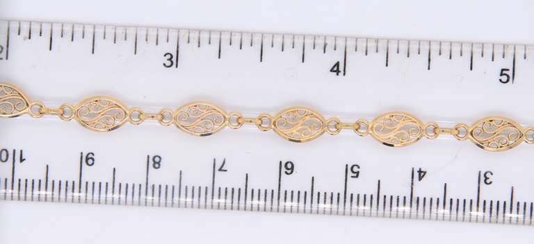 Pleasing Yellow Gold Filagree Link Bracelet