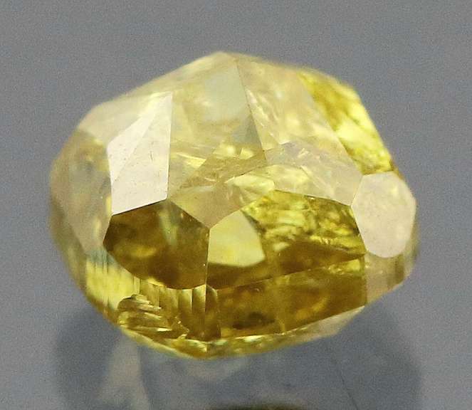 Simply gorgeous! .58ct moss green Diamond