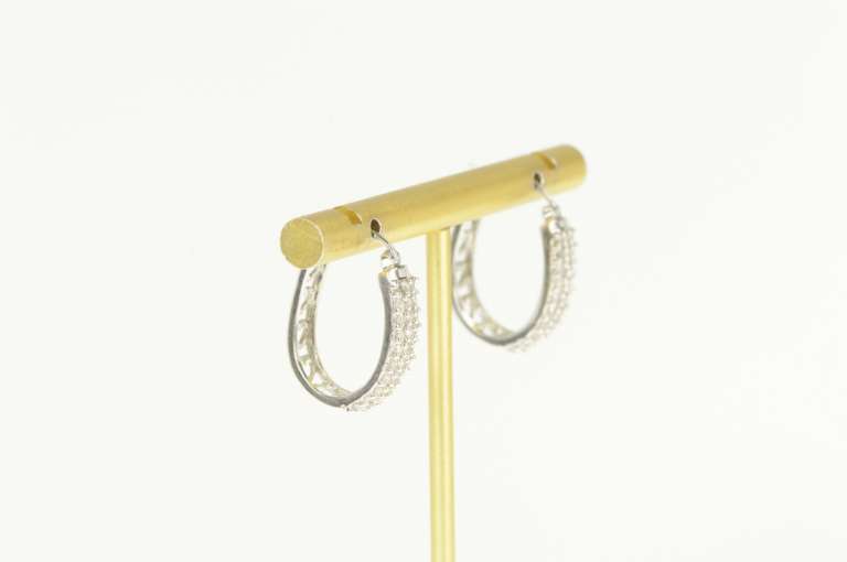 10K White Gold 0.50 Ctw Pave Diamond Encrusted Oval Hoop Earrings