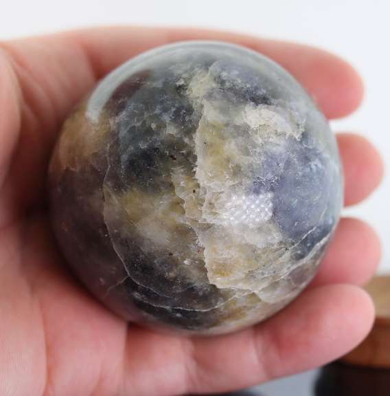 Tremendous 1,378ct sphere cut galaxy patterned Iolite