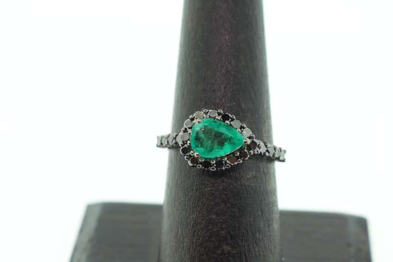 Melancholy Emerald Teardrop 18k White Gold Ring infused with Deep Black Diamonds