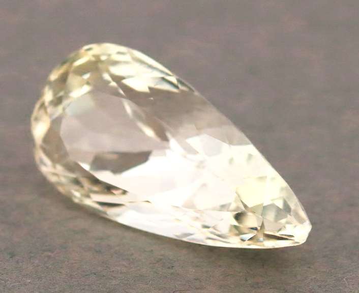 Remarkable 21.89ct high fire platinum blonde Kunzite