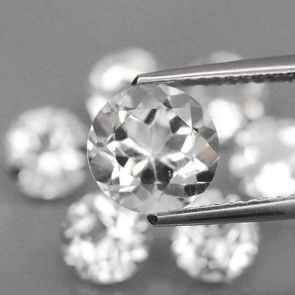 Mixed cut 7.65ct diamond white Topaz set