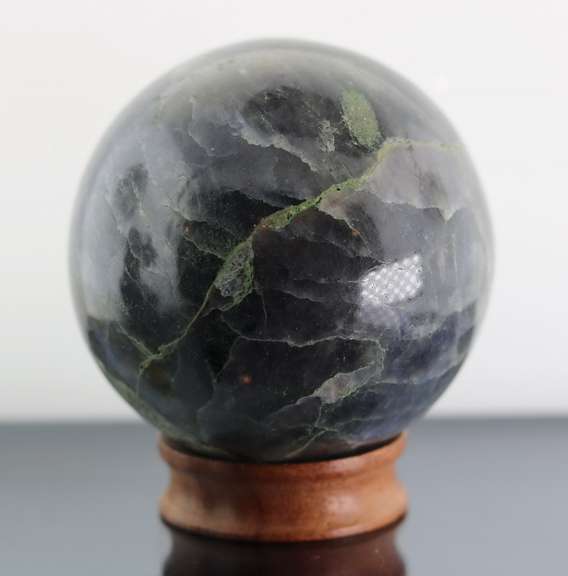 Substantial 1,611ct sphere cut galaxy patterned Iolite