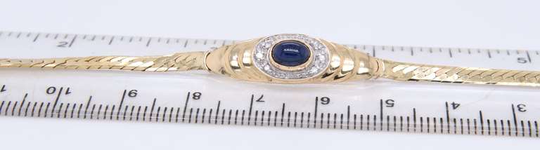 Lovely Yellow Gold Cab Oval Sapphire and Diamond Halo Bracelet