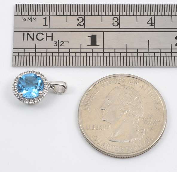Bright Blue Topaz and Diamond Pendant