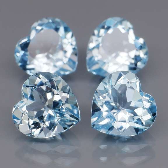 Superb quality 8.72ct 4 piece sky blue Topaz set