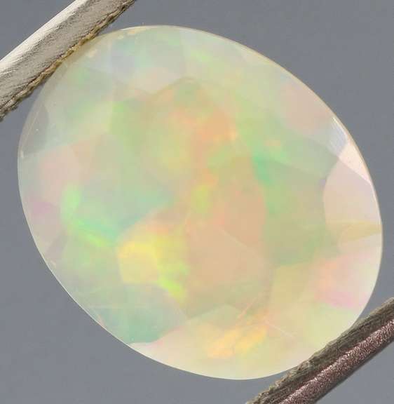 Excellent glittering 1.88ct faceted Jelly Opal