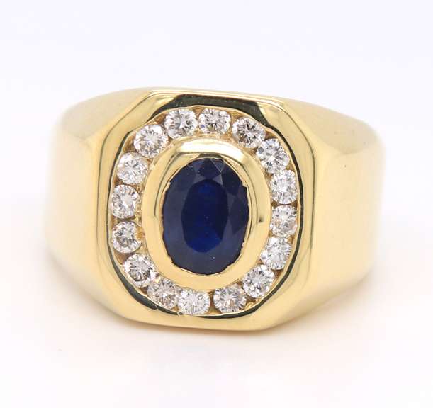 Handsome Yellow Gold oval Sapphire and Diamond Channel Halo Ring