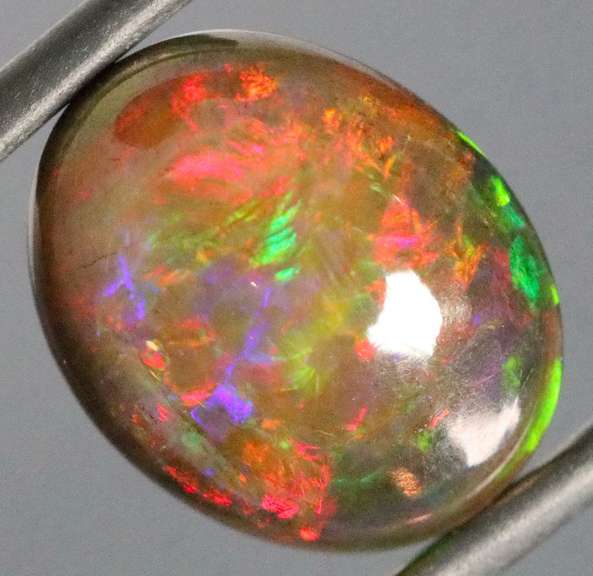 Magnificent 4.70ct full body flashing Semi Black Opal