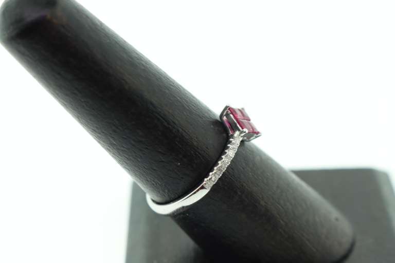 Enrapturing Four Square Ruby 18k White Gold Ring flanked with Diamonds
