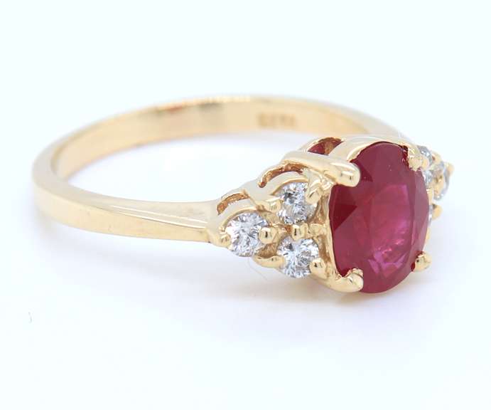 Pleasing Yellow Gold Oval Ruby and Diamond Ring