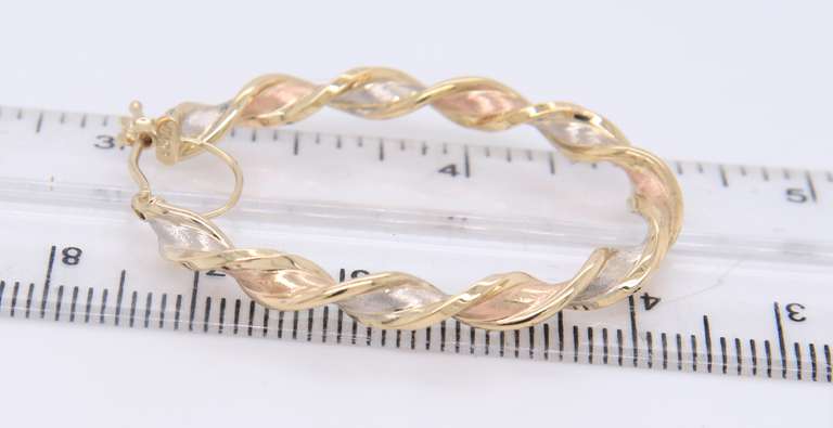 Pleasing 14kt Tri Color Twisted Hoop Earrings