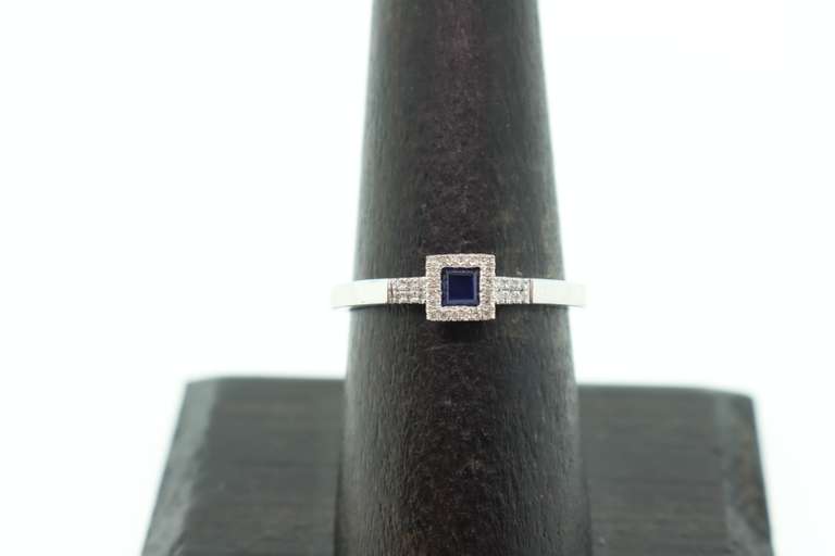 Regal Sole Sapphire 18k White Gold Ring Bordered with Diamonds